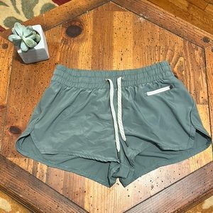 Vuori Athletic Shorts in Sage Green